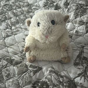 A cute white hamster warmie